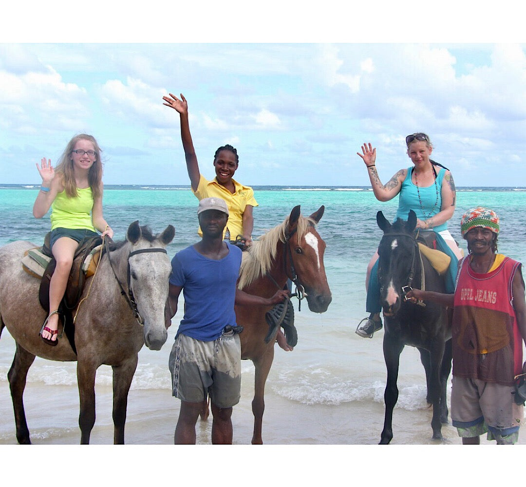 Taking pictures with the horses before the tour