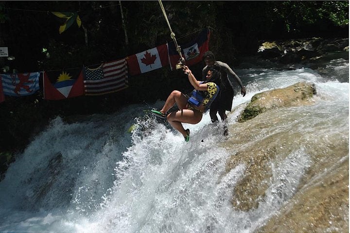 Ropeswing fun at Blue Hole